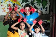 Bright colours, happy faces: As children paint and make the hub more visible, they open the door for more of their peers to come to the hub.