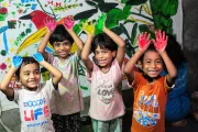 Bright colours, happy faces: As children paint and make the hub more visible, they open the door for more of their peers to come to the hub.