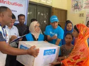 UNICEF staff distributes family kits to households in Moulvibazar District