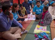 Children from the Korail slum participating in different activities at the makeshift Child Protection Community Hub, established after the original one was engulfed by the fire