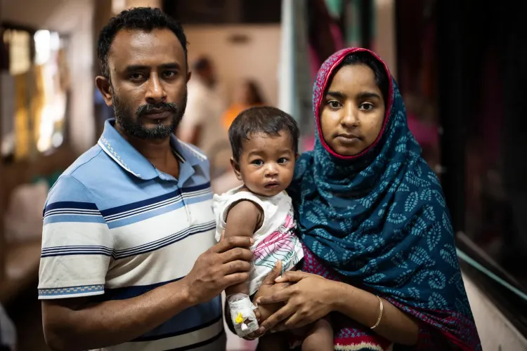 9-month-old Jaifa with her parents Omar Farook and Yasmin at the Infectious Disease Hospital 