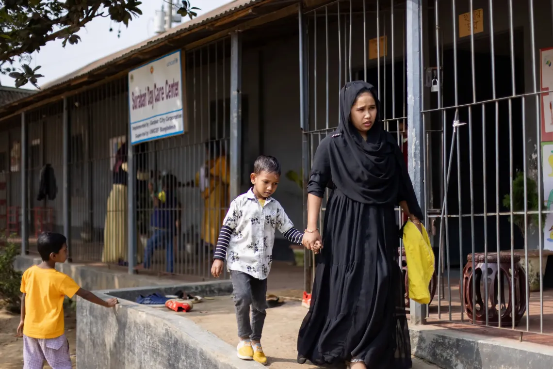 Pinky Akhter and her son Muhammad at the UNICEF-supported Surabari Day-care Center.