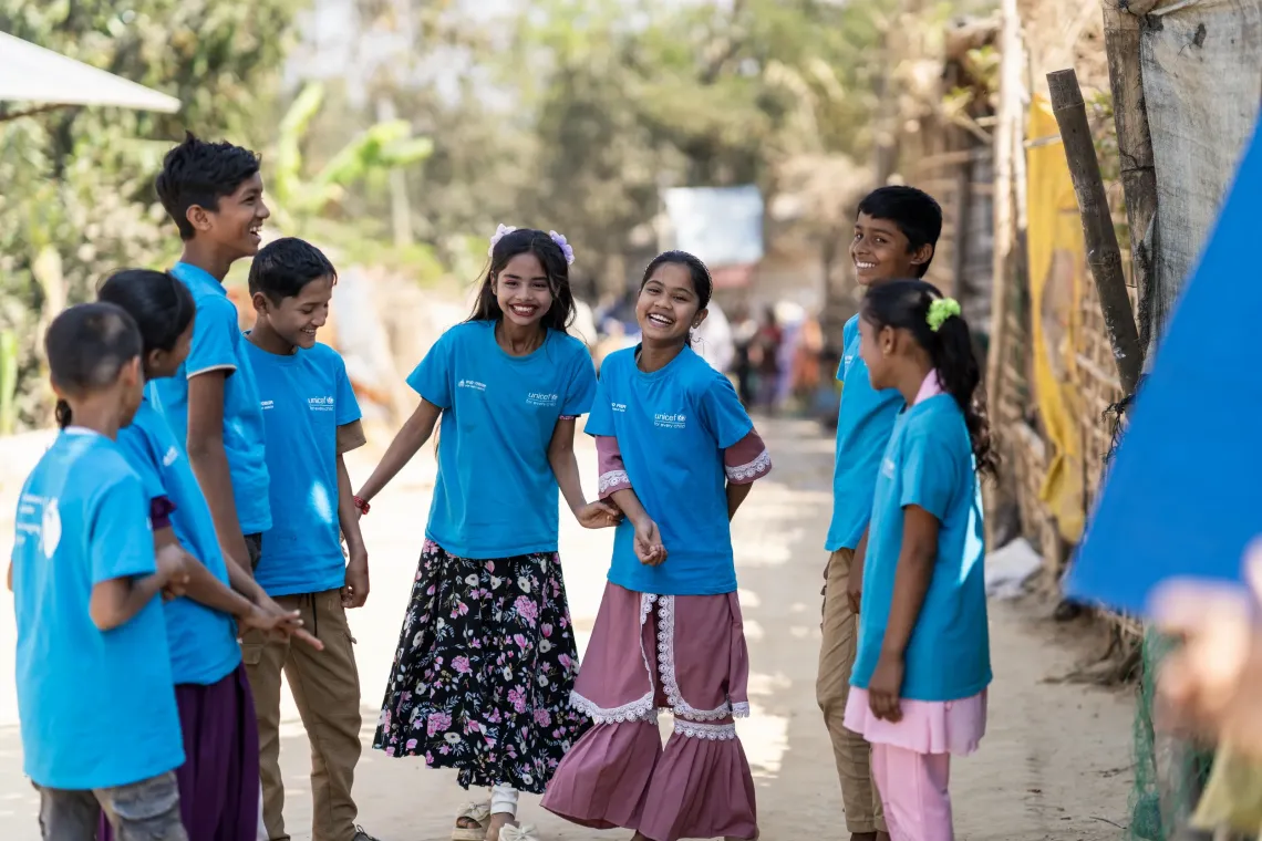 Members of the Child Leaders Group share a joyful moment on a typical day in the Rohingya refugee camps.