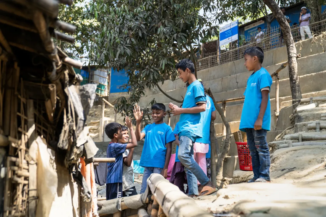 Arafat and the Child Leaders Group visit households and share important hygiene lessons in a playful way.