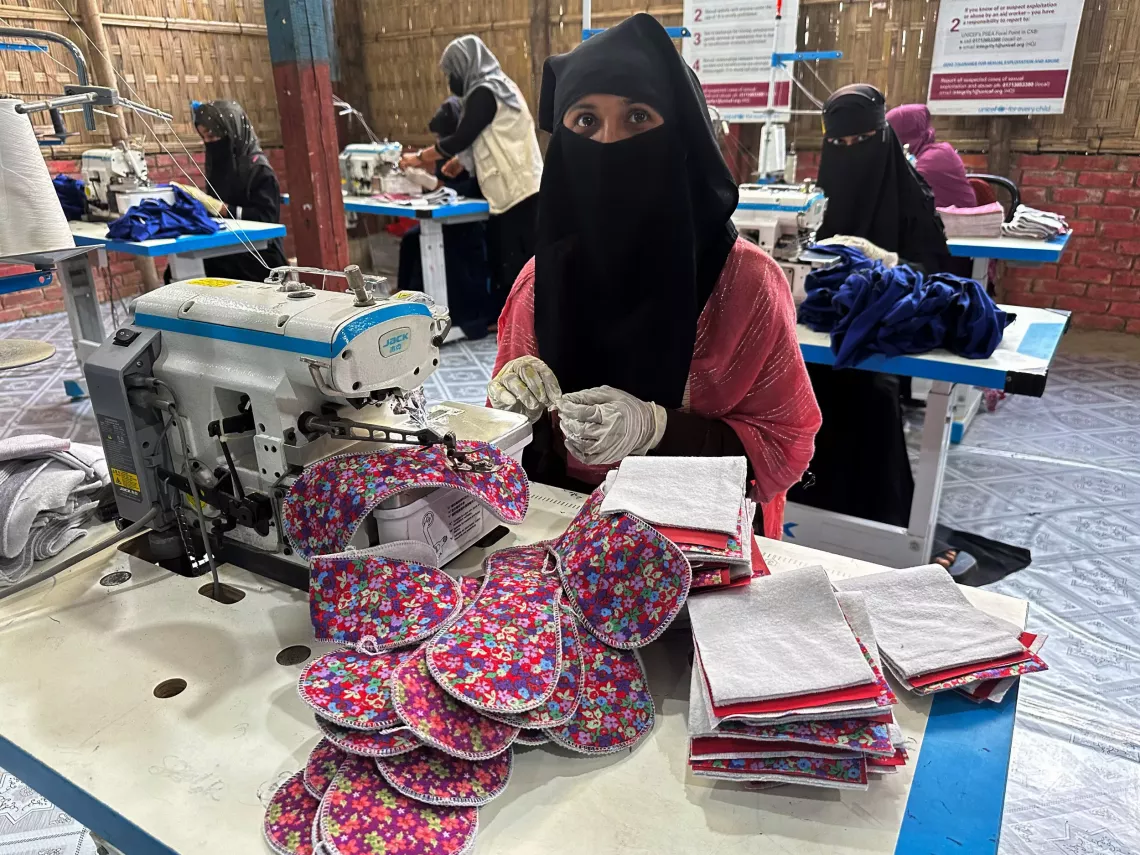    A Rohingya refugee girl makes reusable sanitary pads at the Menstrual Hygiene Management Kit Production Centre in Cox&rsquo;s Bazar.