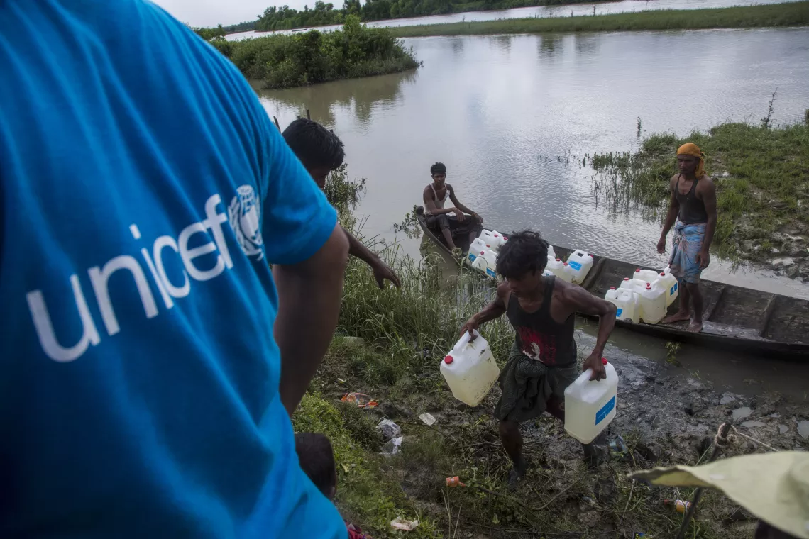 Rohingya children collecting water. Bangladesh