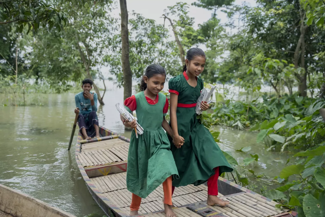 Tawhida and Tania are on their way to the learning centre. Tania aspires to become a teacher, while Tawhida dreams of a future as a doctor. 