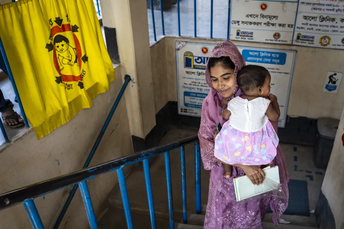 Maushami, Ayesha&rsquo;s mother, climbs the narrow staircase of Alo Clinic, holding her dear daughter in her arms. 