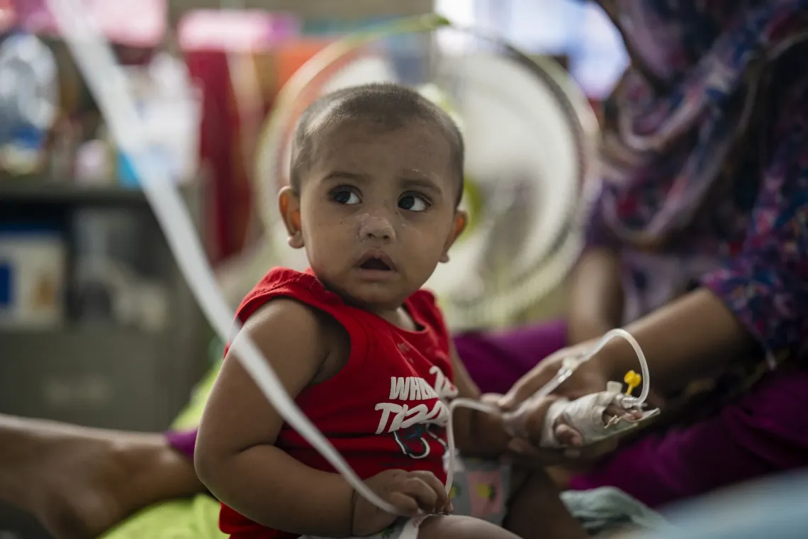 Ruqayyah, 10 months, is cared for by her mother