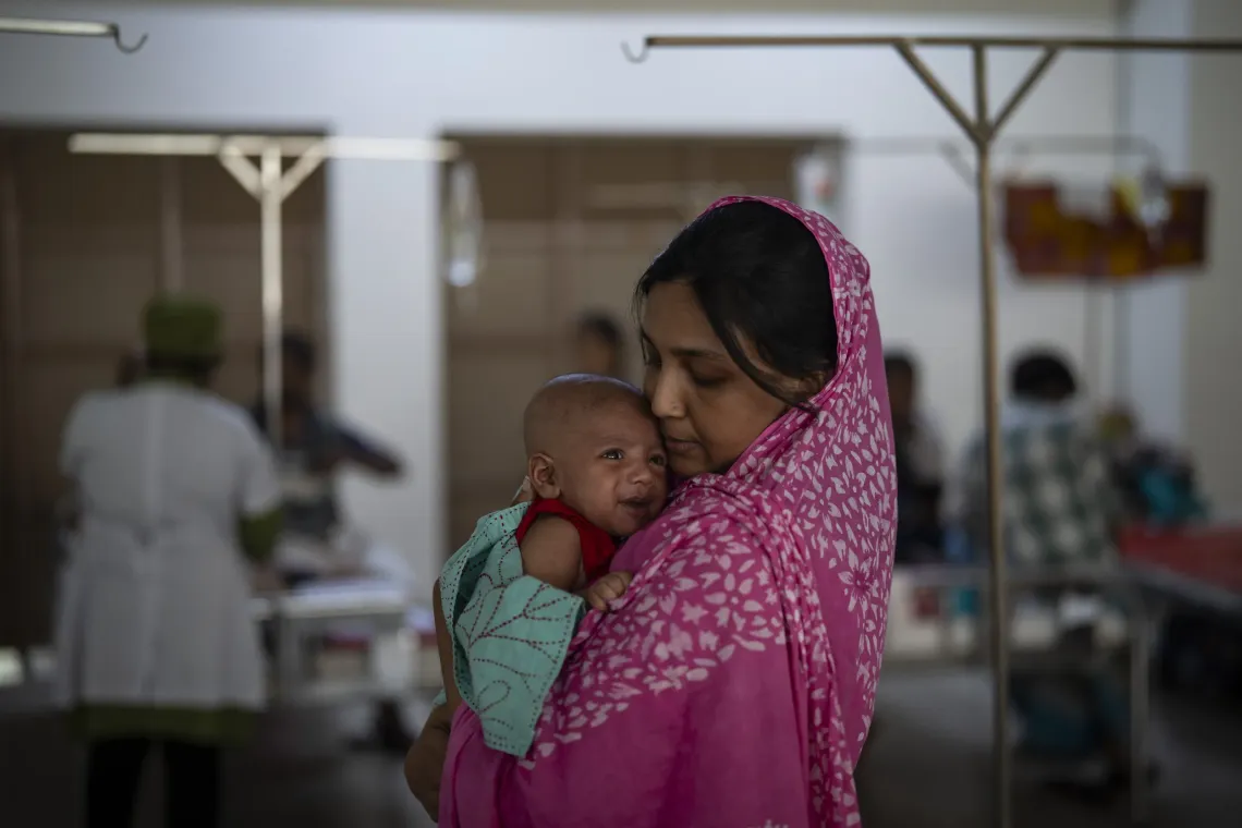 Three-month-old Ayan rests on his mother Brishti&rsquo;s lap at Mohakhali DNCC Hospital, among the youngest children left vulnerable as measles spreads across Bangladesh and vaccination efforts continue. 
