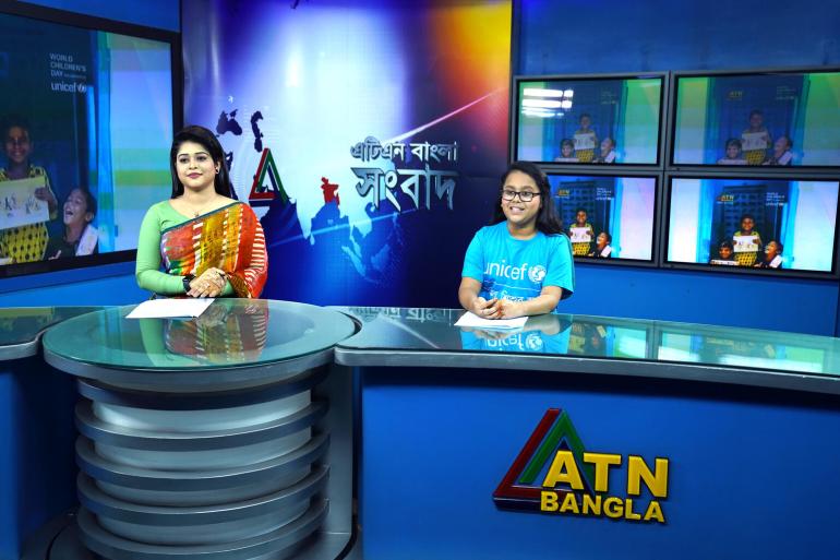 Eleven-year-old Anisha Amin and news reader Vabna Ahmed on the ATN Bangla evening news on World Children’s Day.