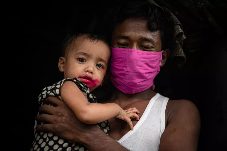 Bangladesh. A Rohingya child and parent