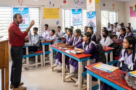 Students actively listen to their teacher Abdul Baten Munshi