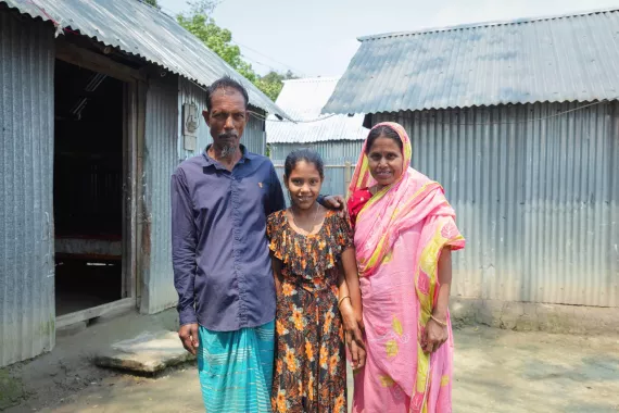 Shohana and her parents at home in Mymensingh, northeast Bangladesh.