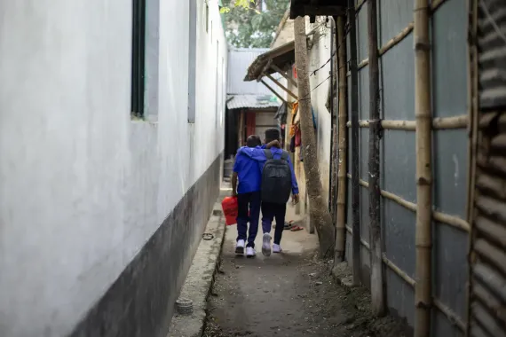 Abrar and Riyad in their school uniform on their way to school.