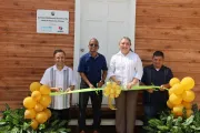 ribbon cutting moment with officials