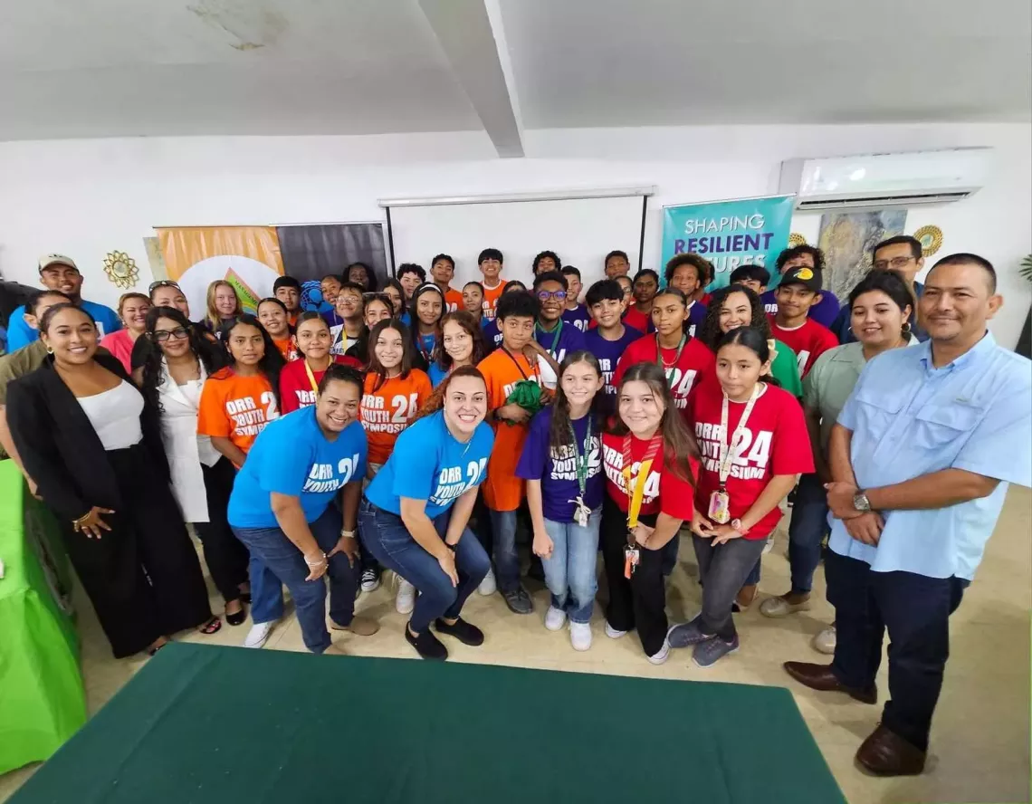 team of youths pose for group photo