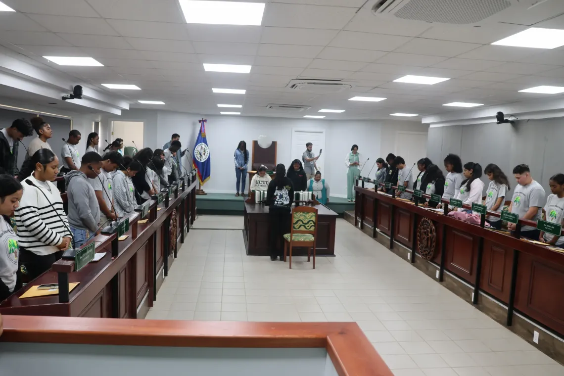 children stand in row in National Assembly