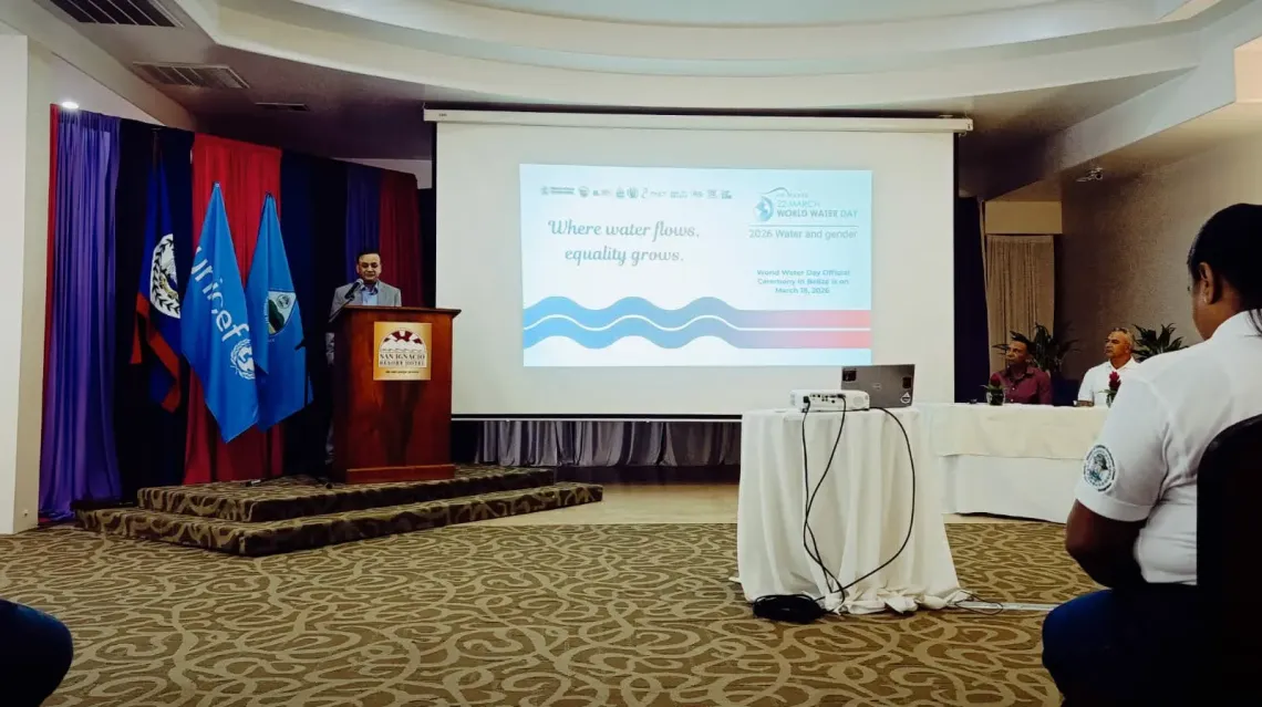 man stands at podium delivering speech