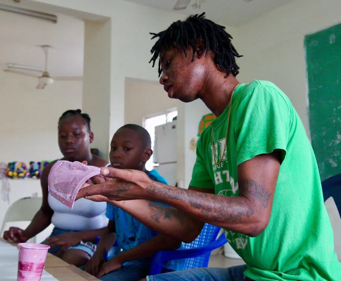 The masks are painted pink to resemble white plantation owners. Jonkunnu was originally a way for the Garifuna to surreptitiously mock their colonial-era masters.  
