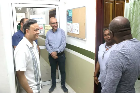 men standing near a door
