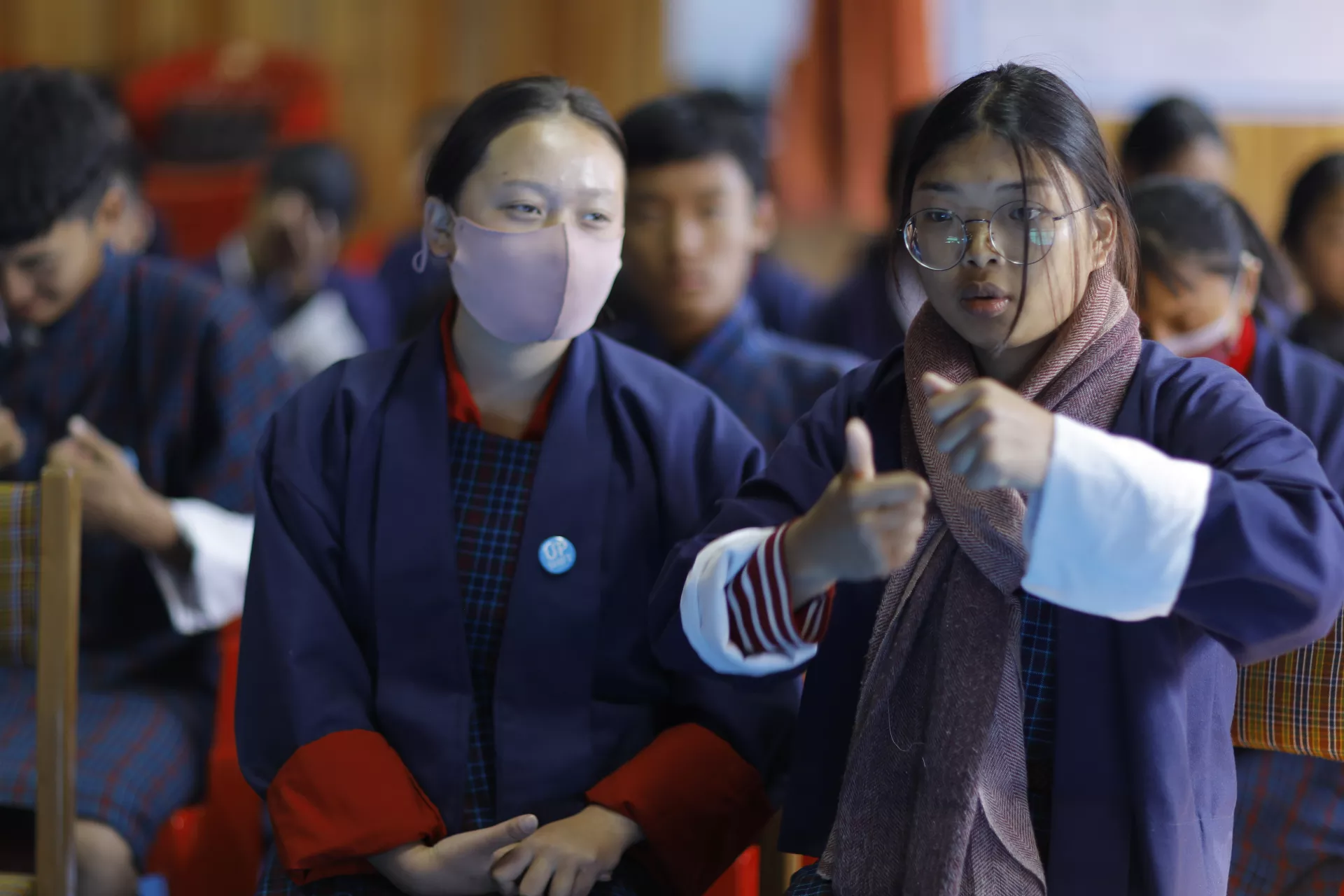 A girl uses sign language to share her views 