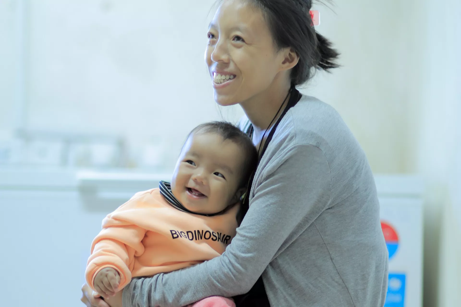 A smiling mother and child