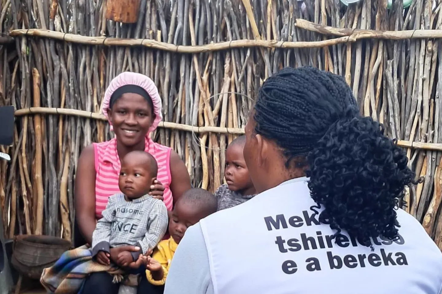 A mother of three having a conversation with UNICEF mission