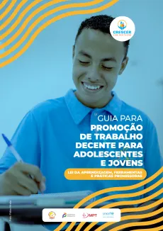 Capa da publica&ccedil;&atilde;o mostra um adolescente sentado em uma carteira escolar escrevendo em um caderno. Ele est&aacute; sorrindo.