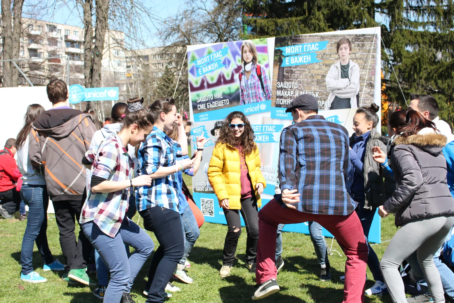 Adolescents and youth are dancing on the field in Sofia, Bulgaria, participating in UNICEF organized event. 