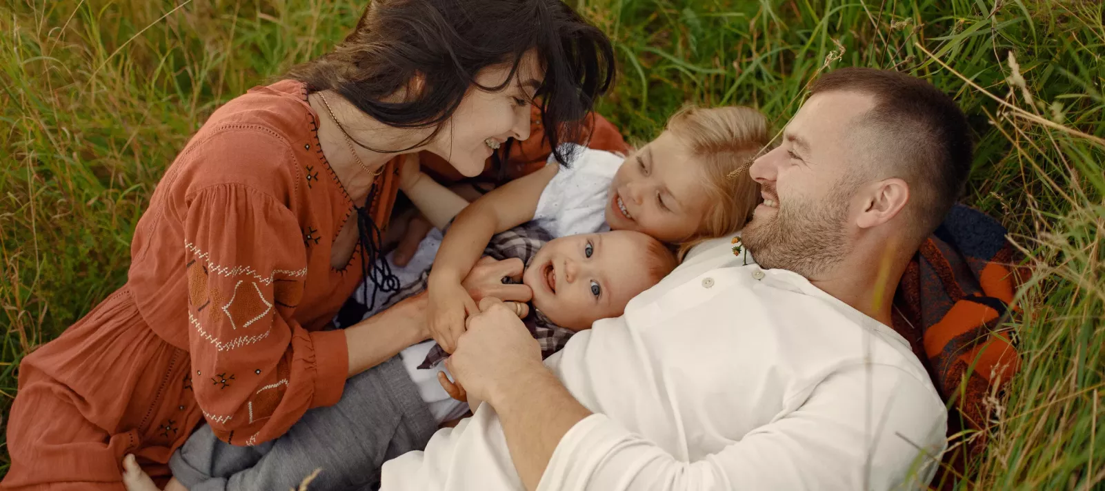 Happy family in the nature