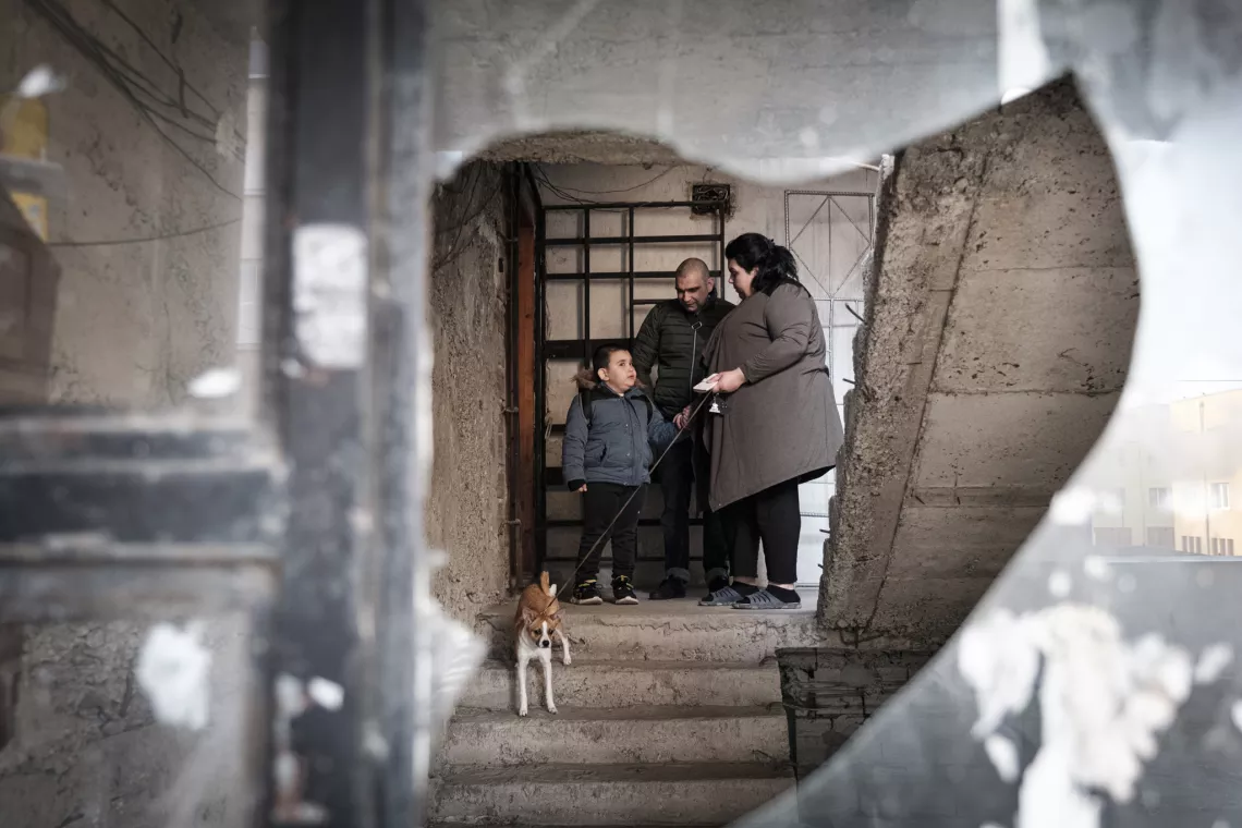 Galin's family - mother and father  are going out of their home