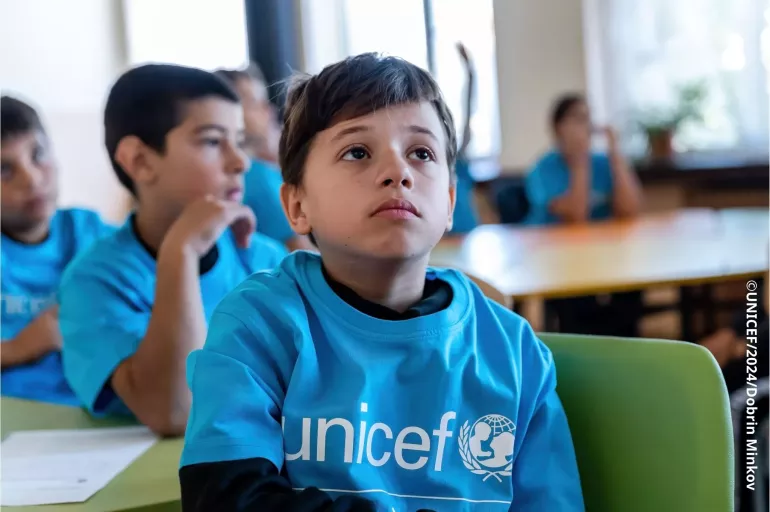 A kid in school during Steps Together programme