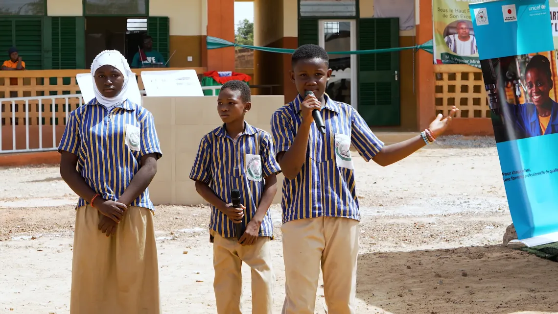 Astride recited a slam poem with her two classmates during the inauguration of the eight general education and technical and vocational training colleges.