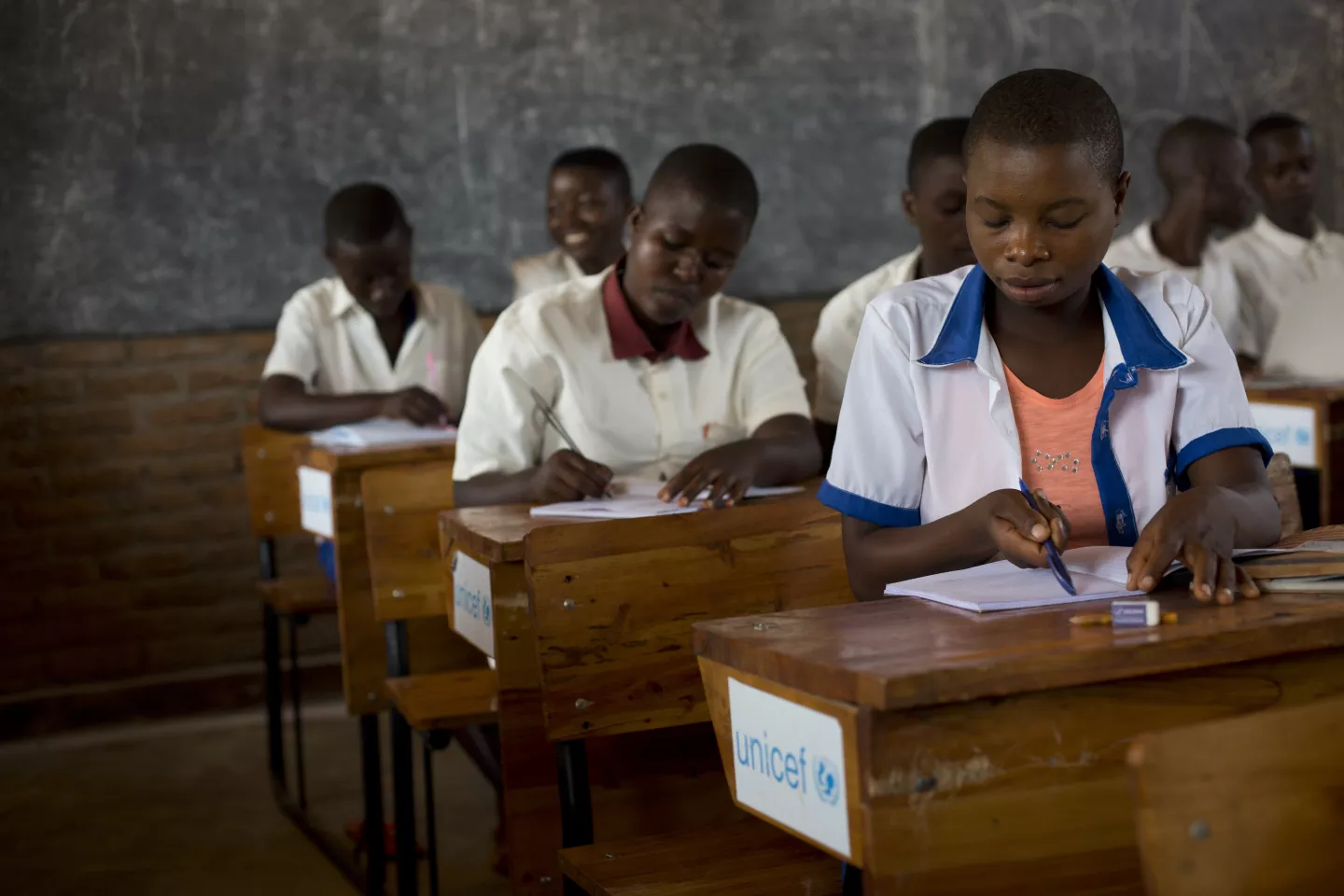 Pupils sit in new classrooms in the new part of the school, Nyanza Lac 5 at Nyanza Lac in Burundi. The school added two new classrooms build by UNICEF with funding of the Swedish Development Aid. 