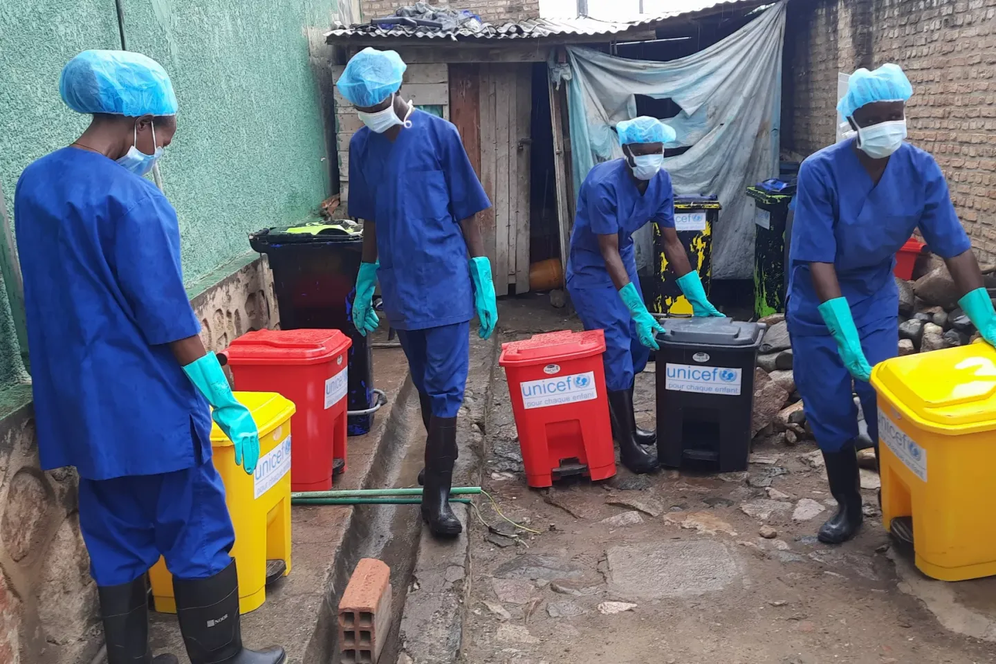 Cleaners collecting waste at the &lsquo;Notre Dame La Misericorde&rsquo; hospital in Musaga