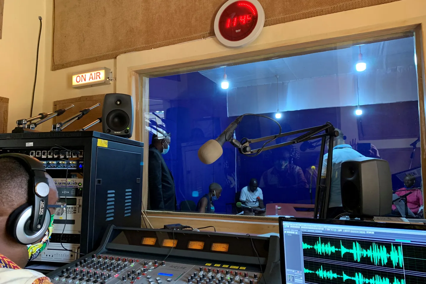 A radio studio with a computer