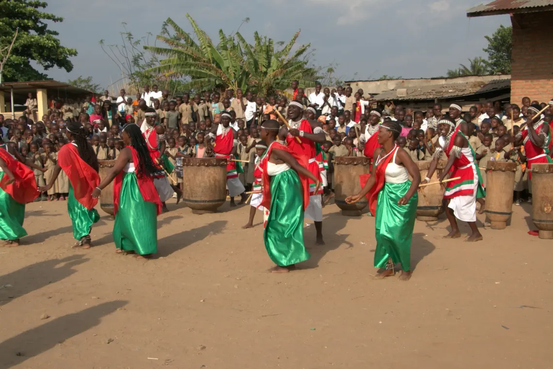 Traditional dancers and drummers entertain participants during the ceremony