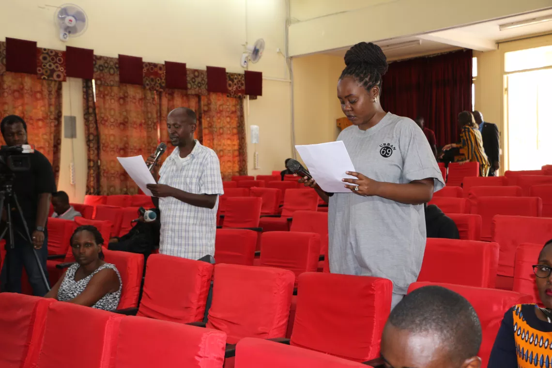 Members from local theatre group &ldquo;Buja Sans Tabou&rdquo; reading testimonies of trafficked children.