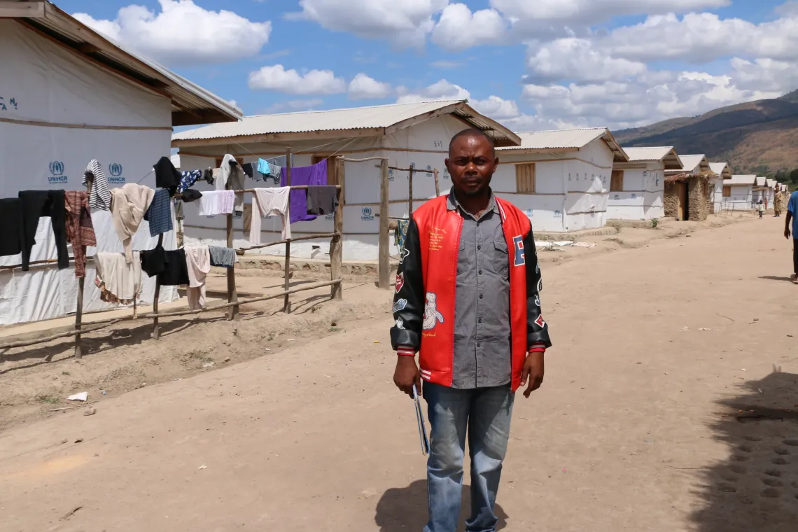 Oscar Okito, one of the community outreach workers who move through the camp&rsquo;s pathways, going door to door to raise awareness among families about good health practices.