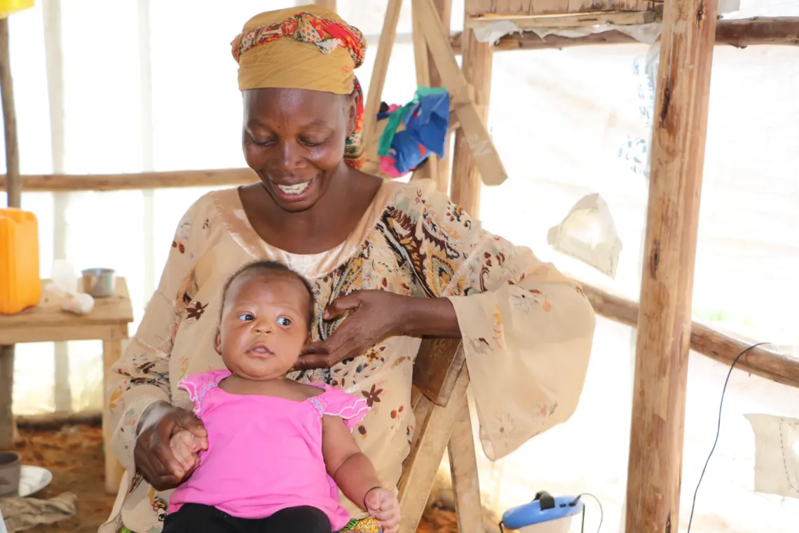 Jeanne Mangalewa, with her baby born in this clinic&mdash;a place now associated with one of the most beautiful days of her life. 