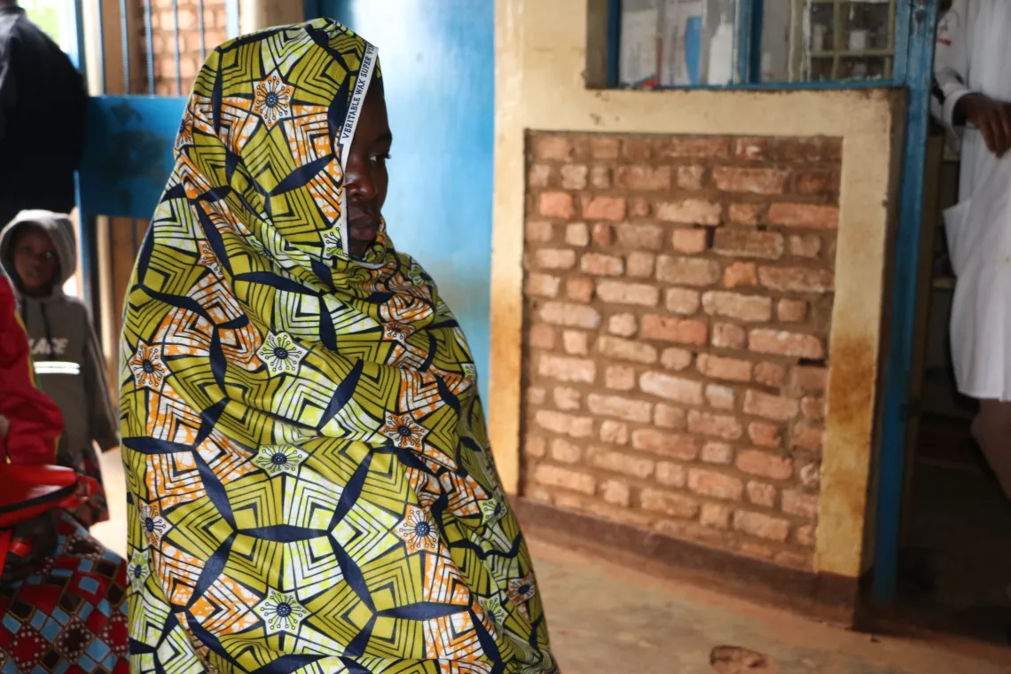 Pregnant woman waiting for a prenatal vaccination at the Ruhororo health center.