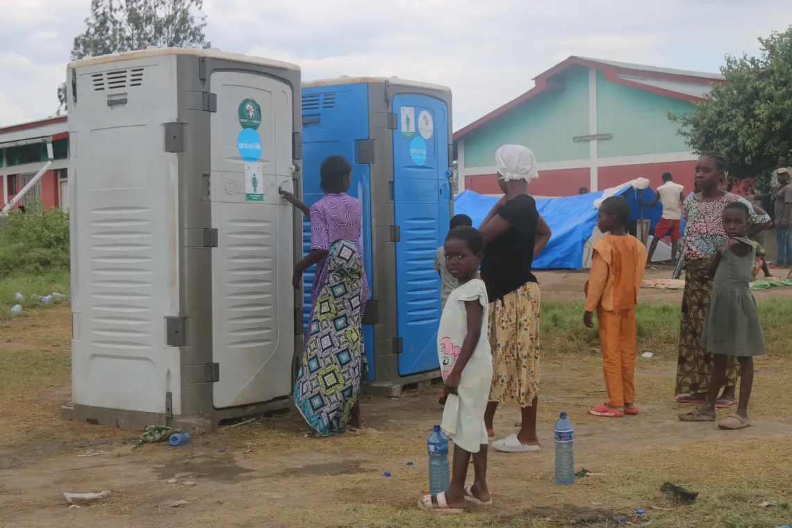 Mobile toilets provided by UNICEF, used by refugees at the Gatumba site