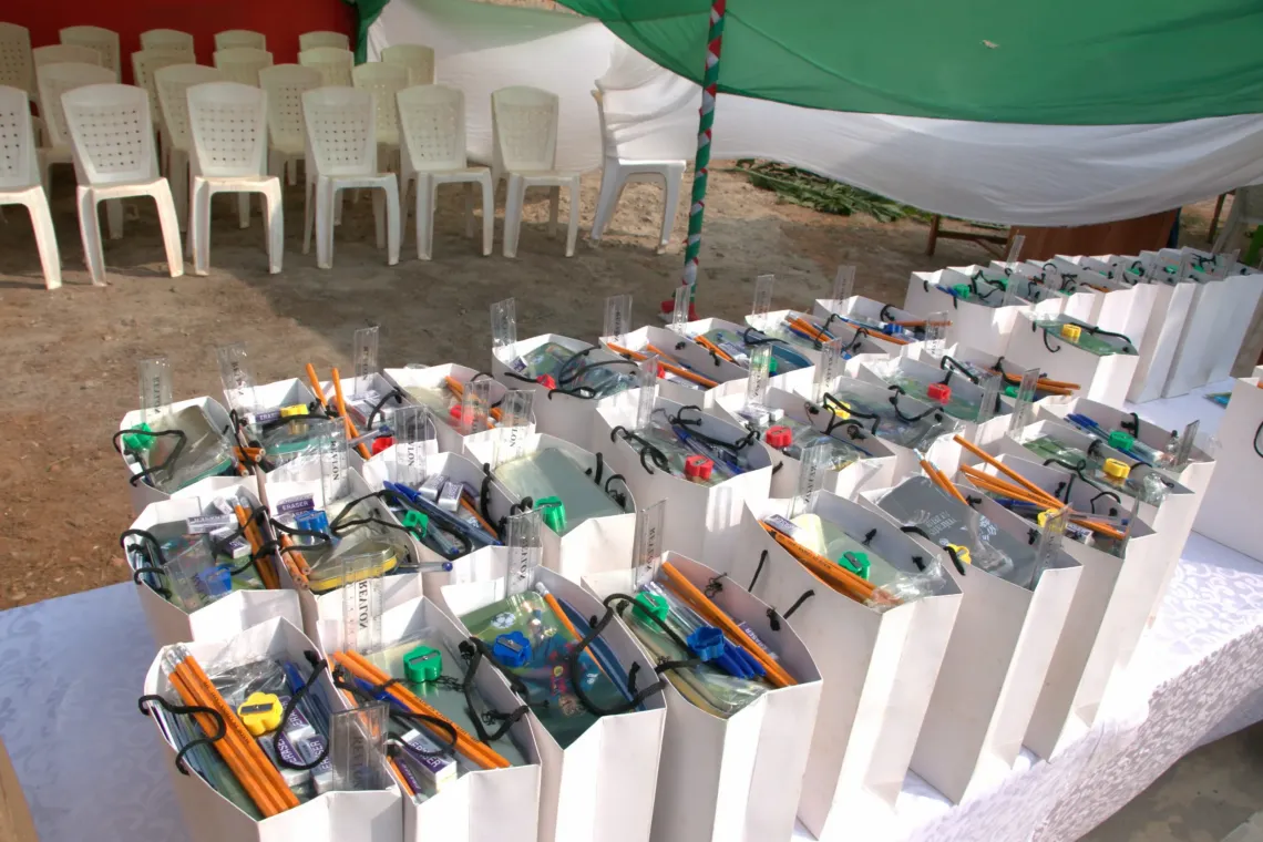School kit containing notebooks, geometry sets, pens, pencils, rulers, sharpeners and erasers