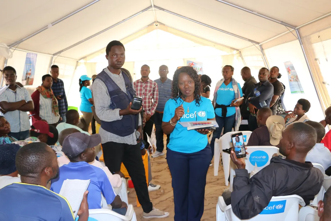 Thanks to UNICEF&rsquo;s support, health specialist Rose Nkiko assists community health workers in Busuma, preparing them through practical orientations before their deployment for household visits. 