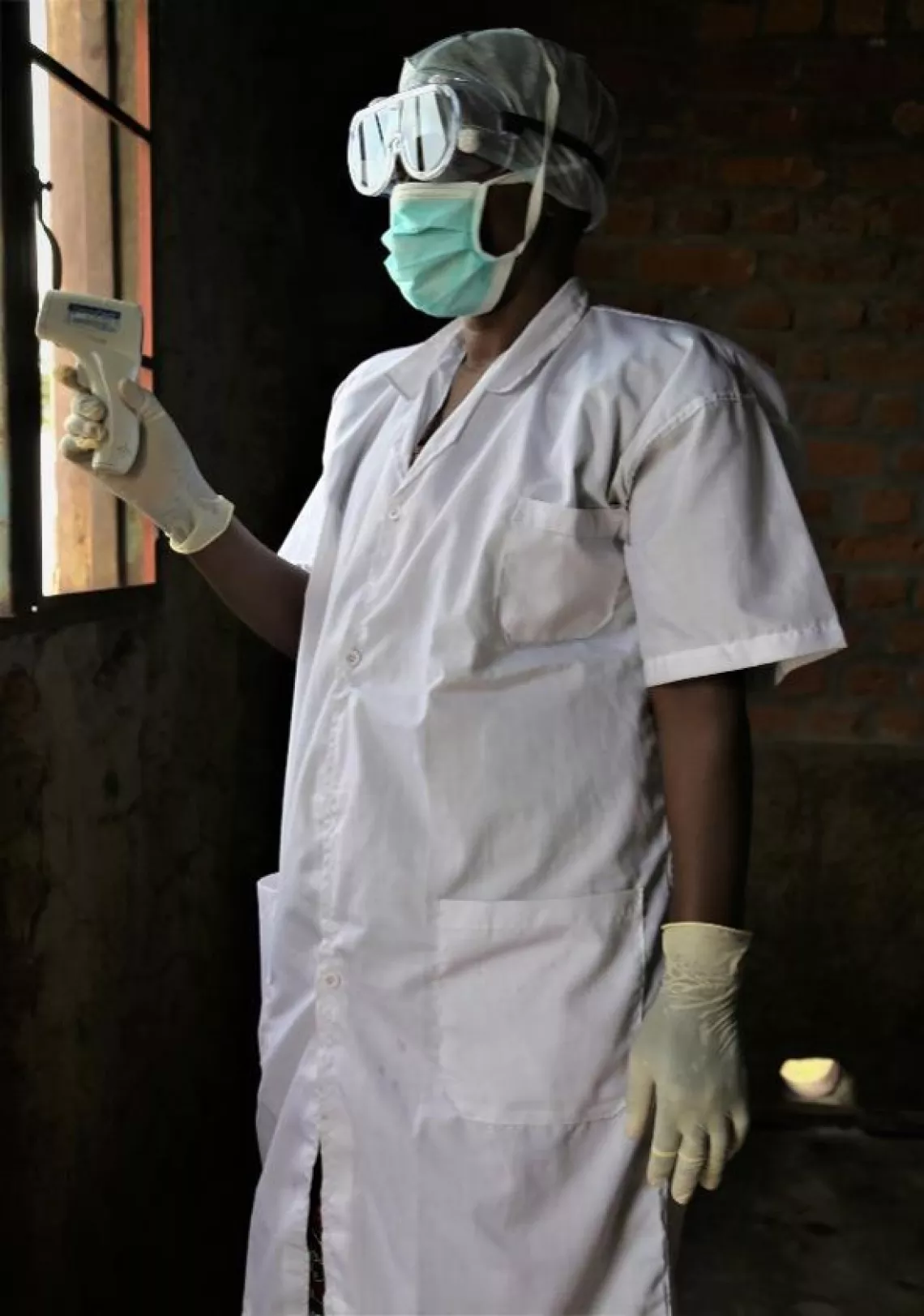 A health worker at the Rumonge port in charge of screening travelers. 