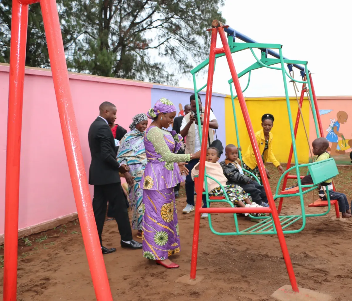 The First Lady visiting a children's play area during the inauguration of the Baby-Friendly Community Space in Mutobo.
