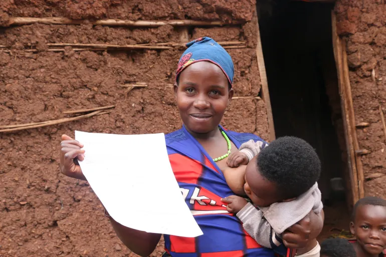  A mother presents her child&rsquo;s birth certificate in Kirundo, northern Burundi, where UNICEF supports birth registration