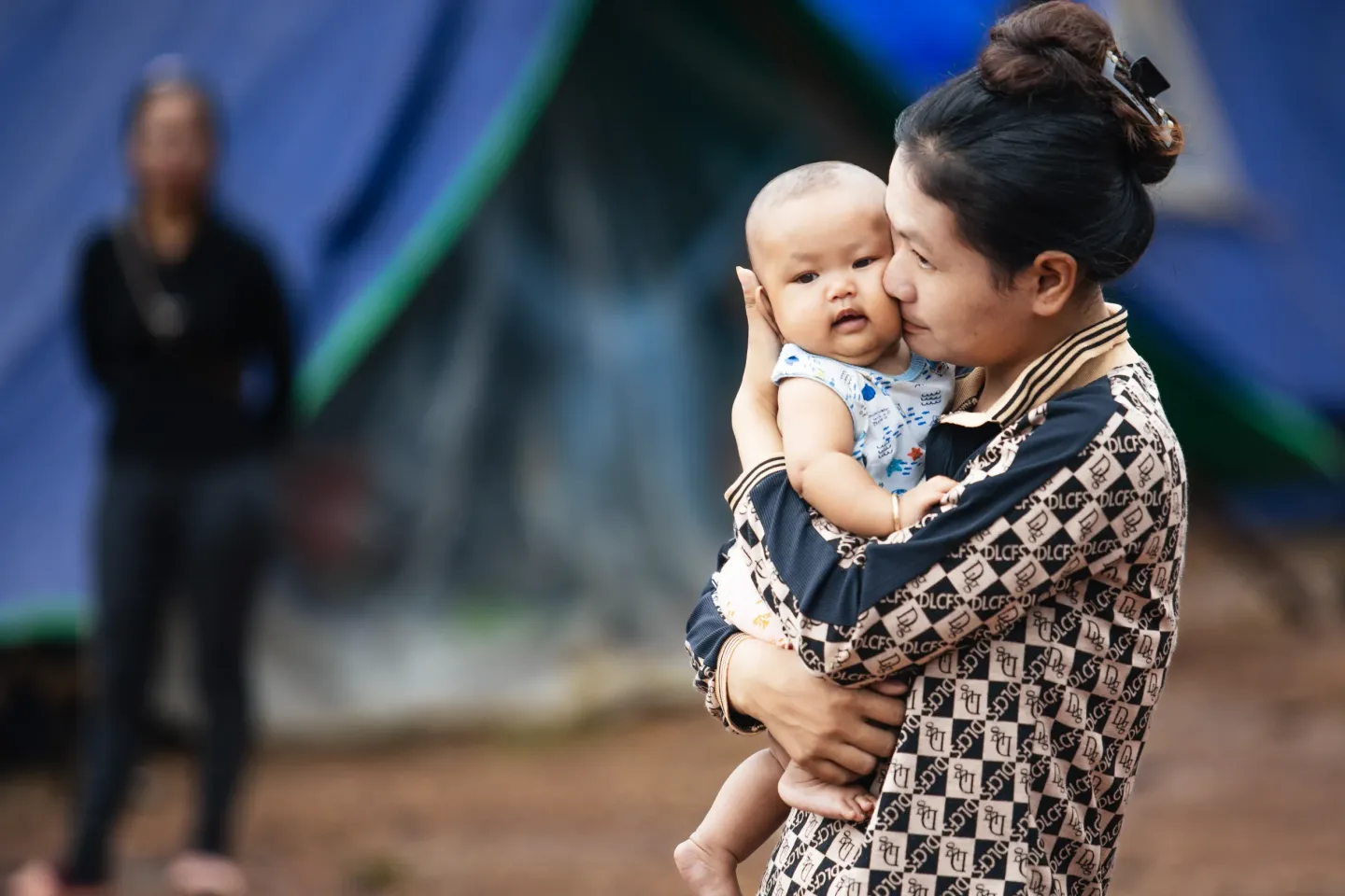 A mother and child in displacement site Preah Vihear, 2025