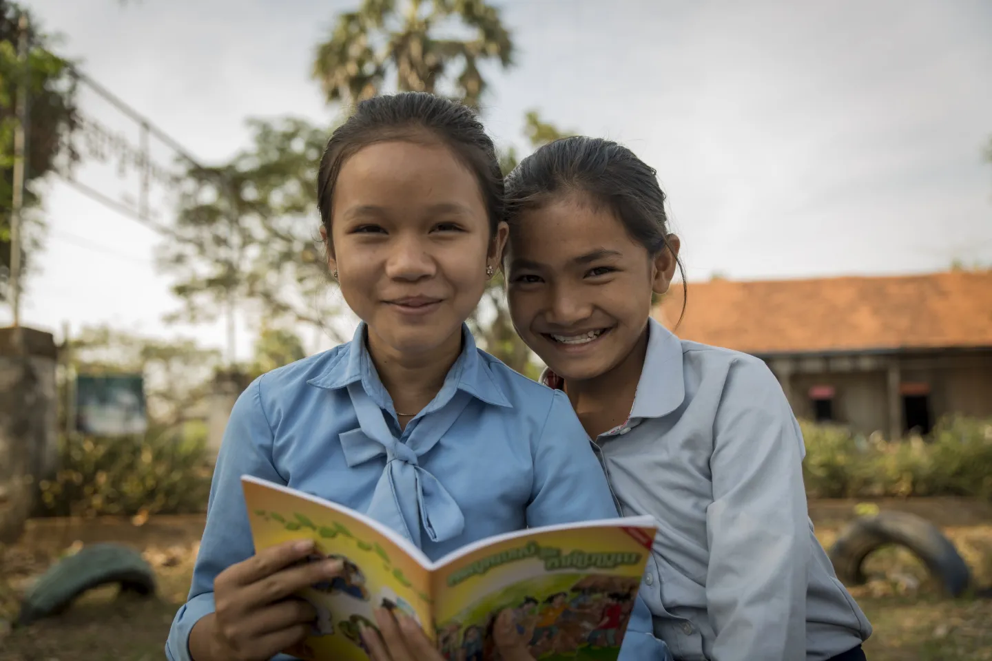 Girls reading Growth and Change book